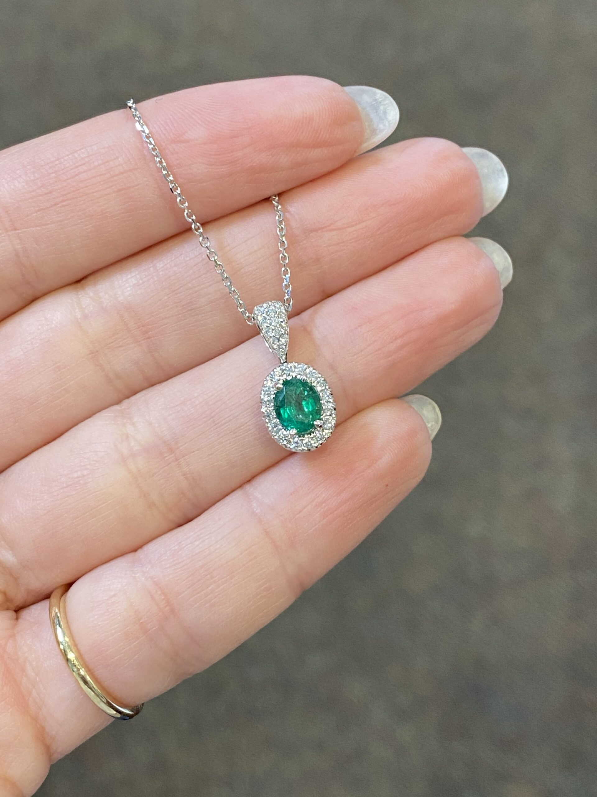 14k White Gold Oval Shaped Genuine .64 Cttw Emerald & Diamond Halo Pendant - Image 2