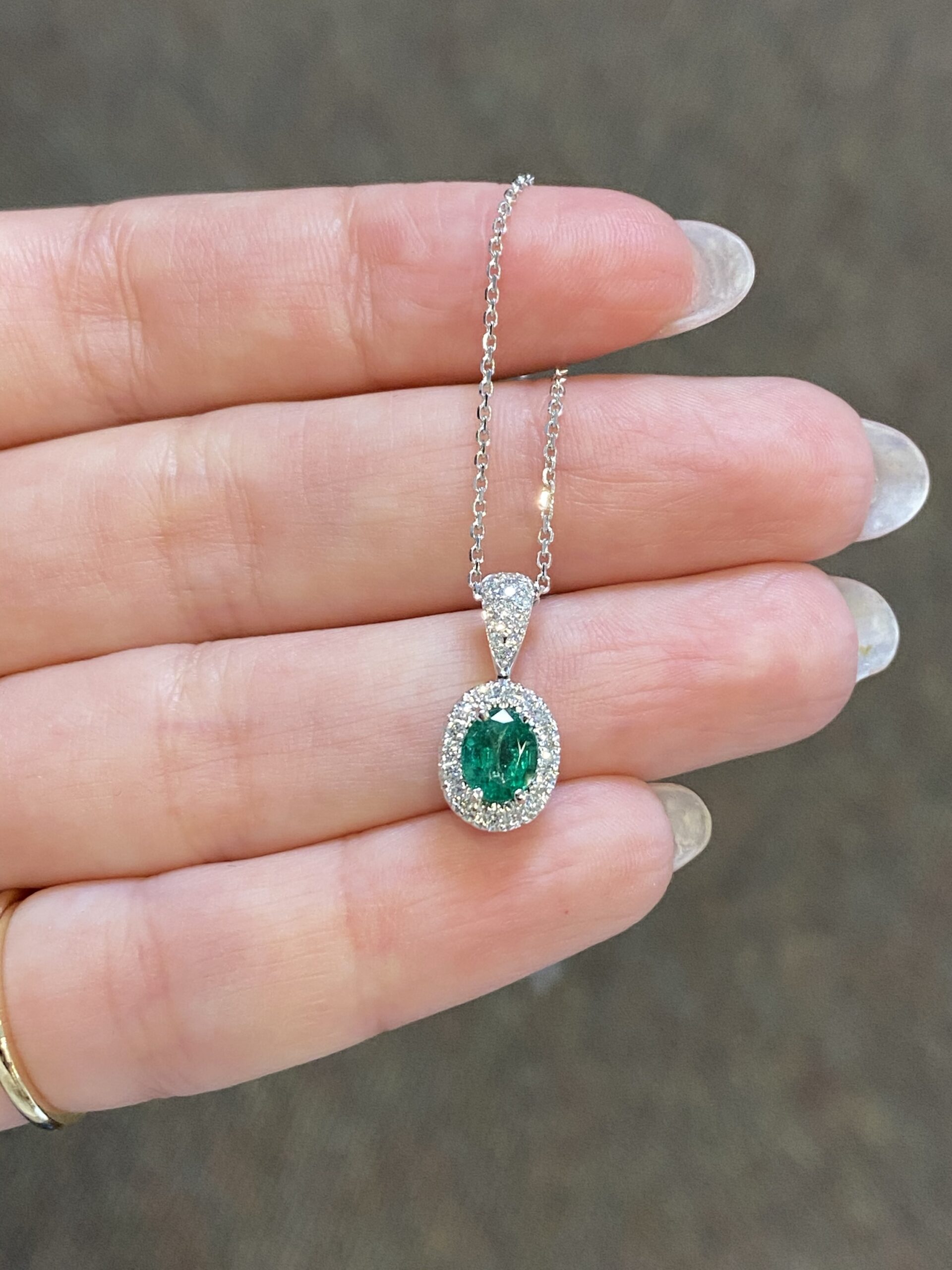 14k White Gold Oval Shaped Genuine .64 Cttw Emerald & Diamond Halo Pendant - Image 4