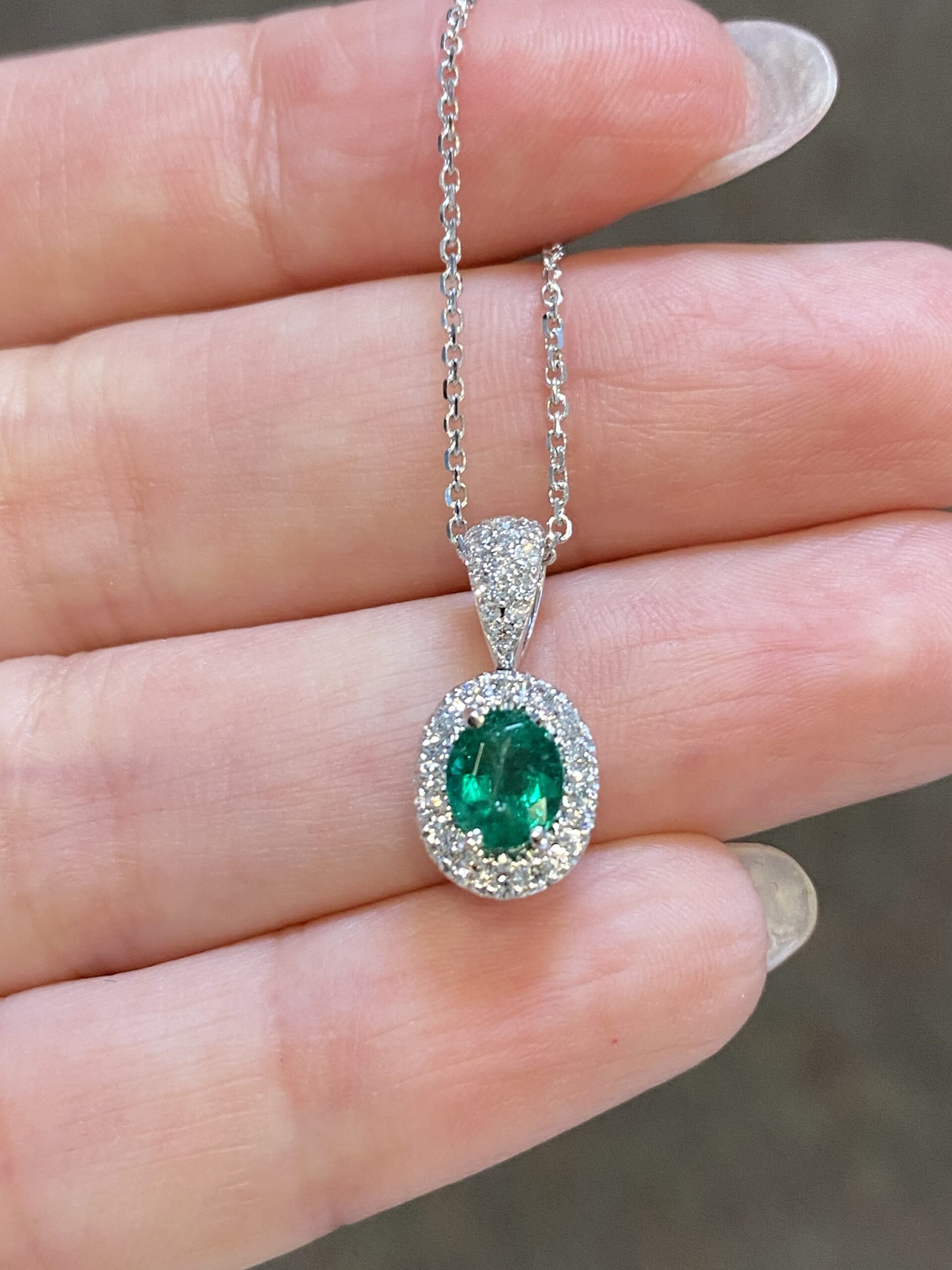 14k White Gold Oval Shaped Genuine .64 Cttw Emerald & Diamond Halo Pendant - Image 3