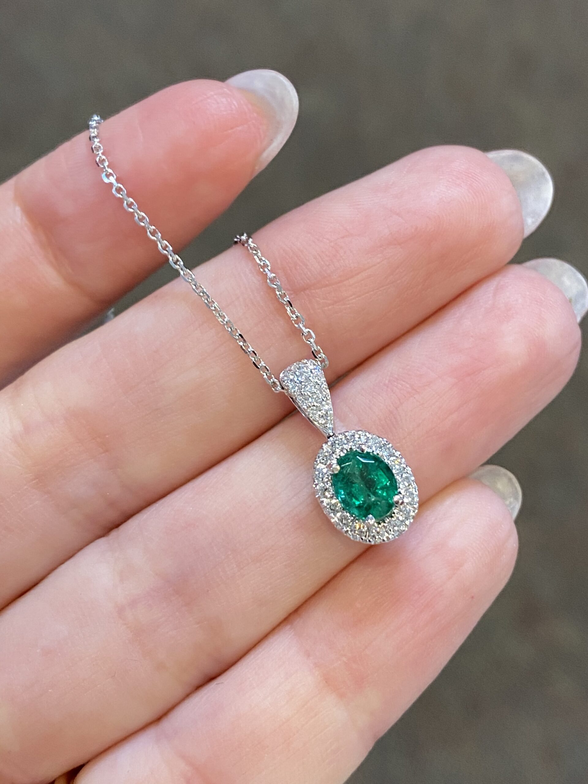 14k White Gold Oval Shaped Genuine .64 Cttw Emerald & Diamond Halo Pendant - Image 5