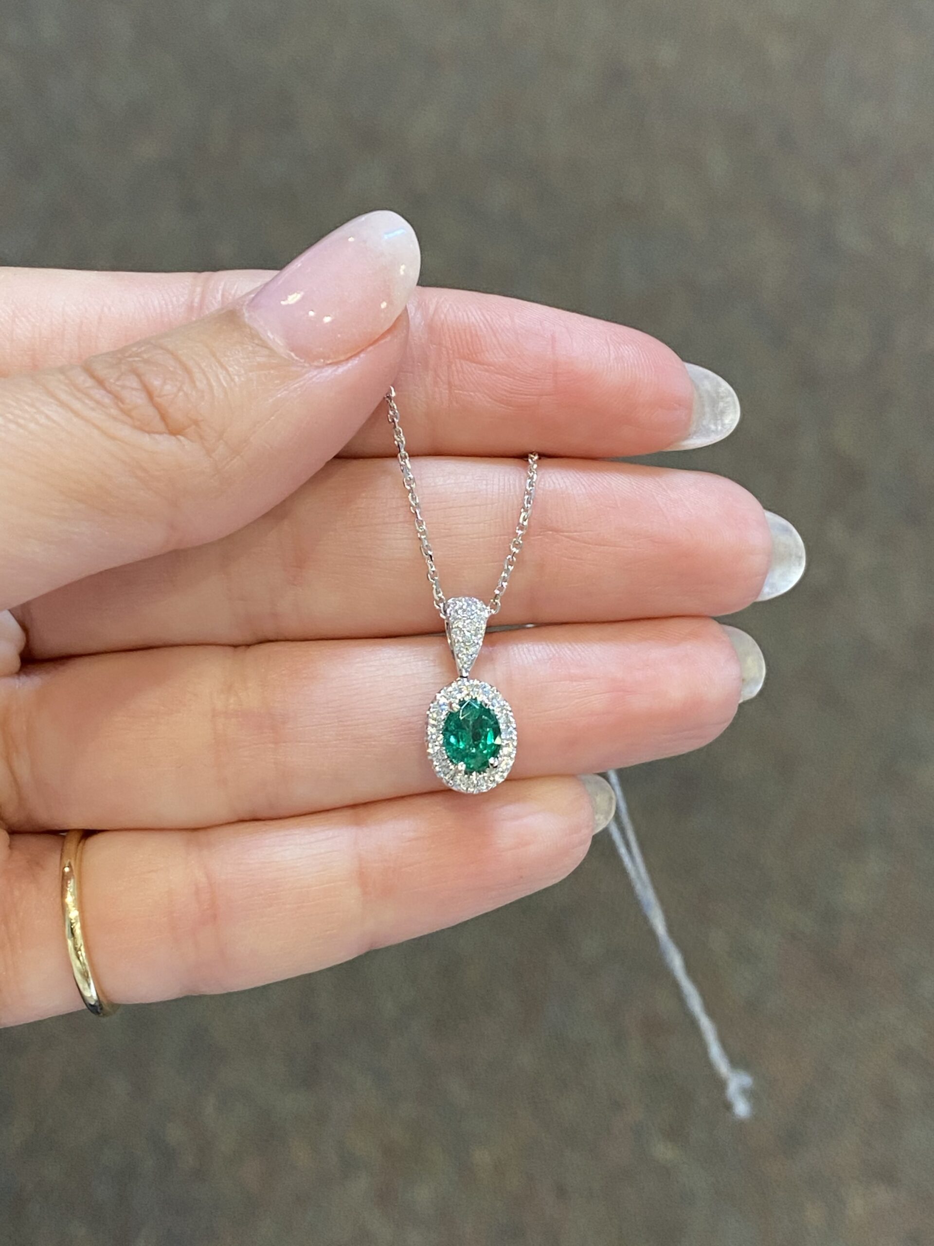 14k White Gold Oval Shaped Genuine .64 Cttw Emerald & Diamond Halo Pendant - Image 8