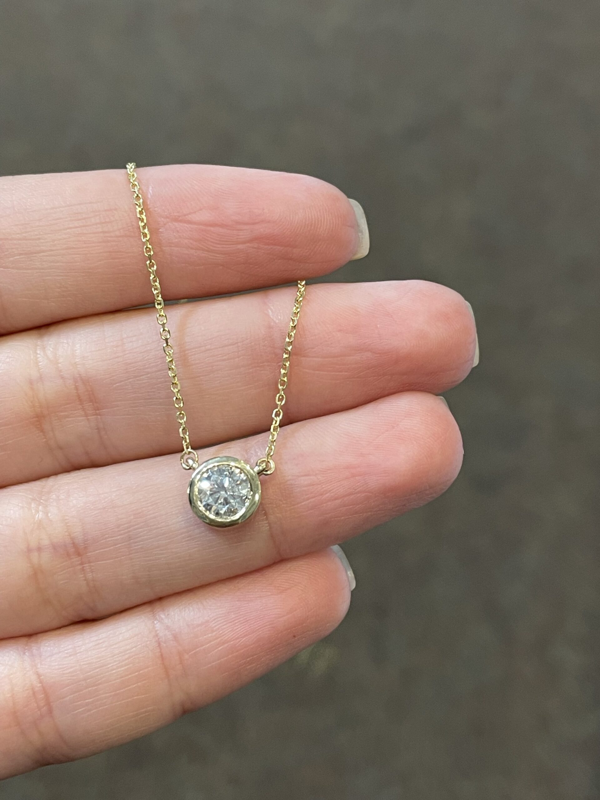 14k Yellow Gold Bezel Set .71 Cttw Round Brilliant Cut Diamond Pendant