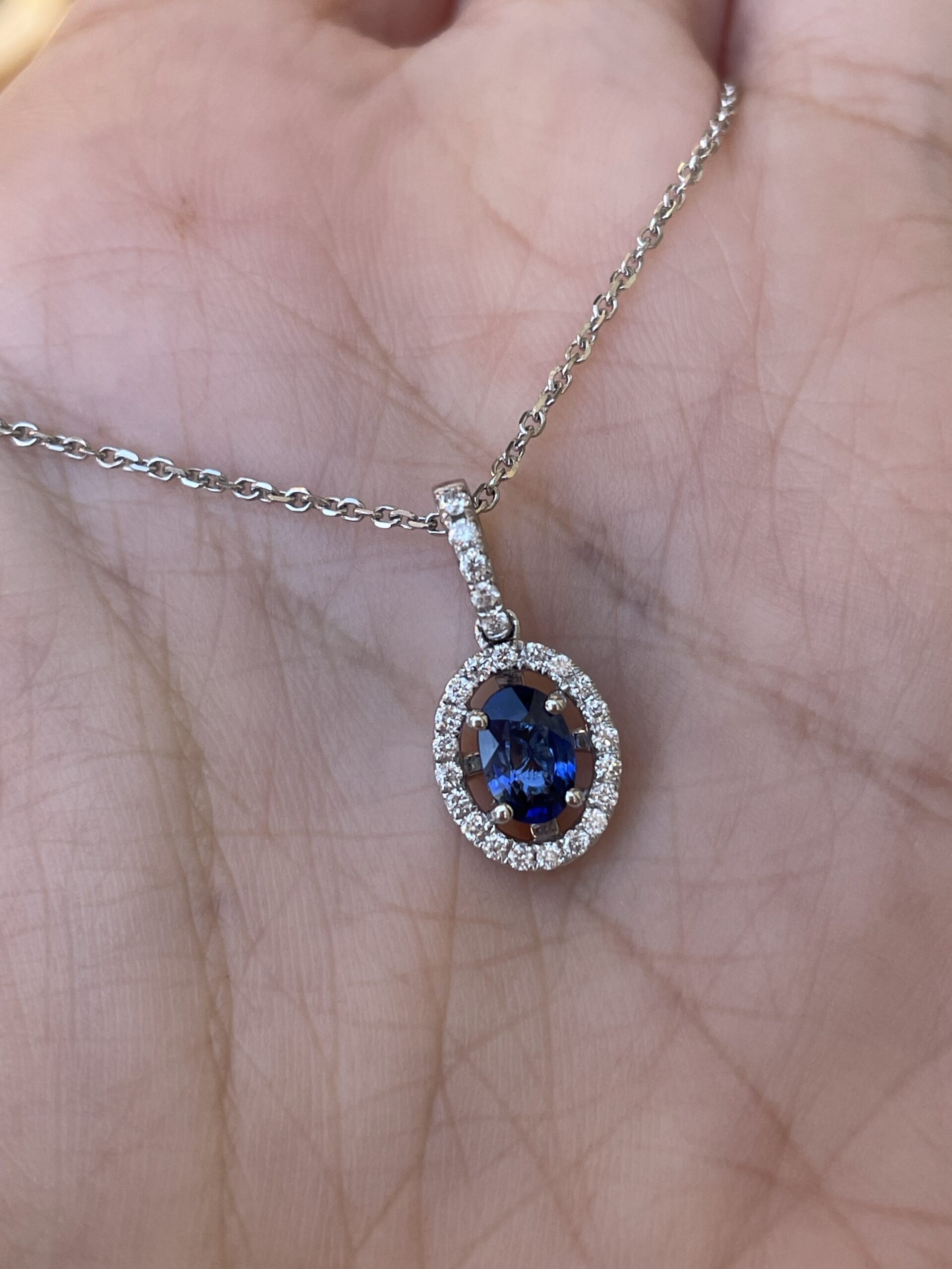 14k White Gold .51 Cttw Oval Shaped Genuine Sapphire & .17 Cttw Round Brilliant Cut Diamond Halo Pendant - Image 9