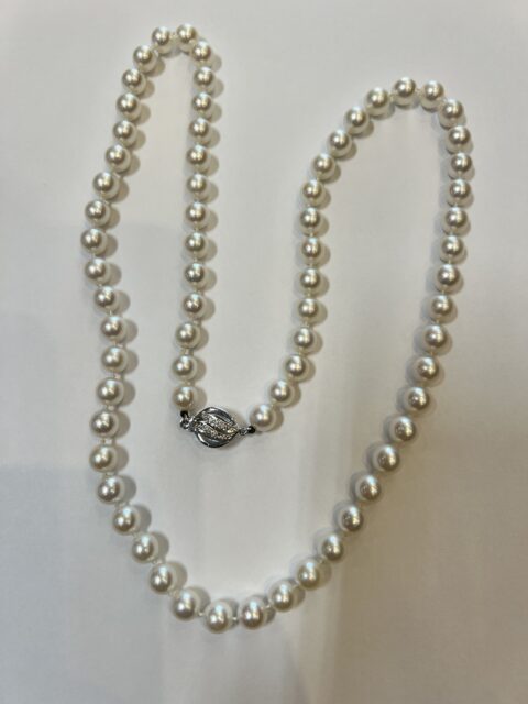 A 24” Strand Of Cultured 7-7.5 MM Saltwater Pearls With Diamond Clasp