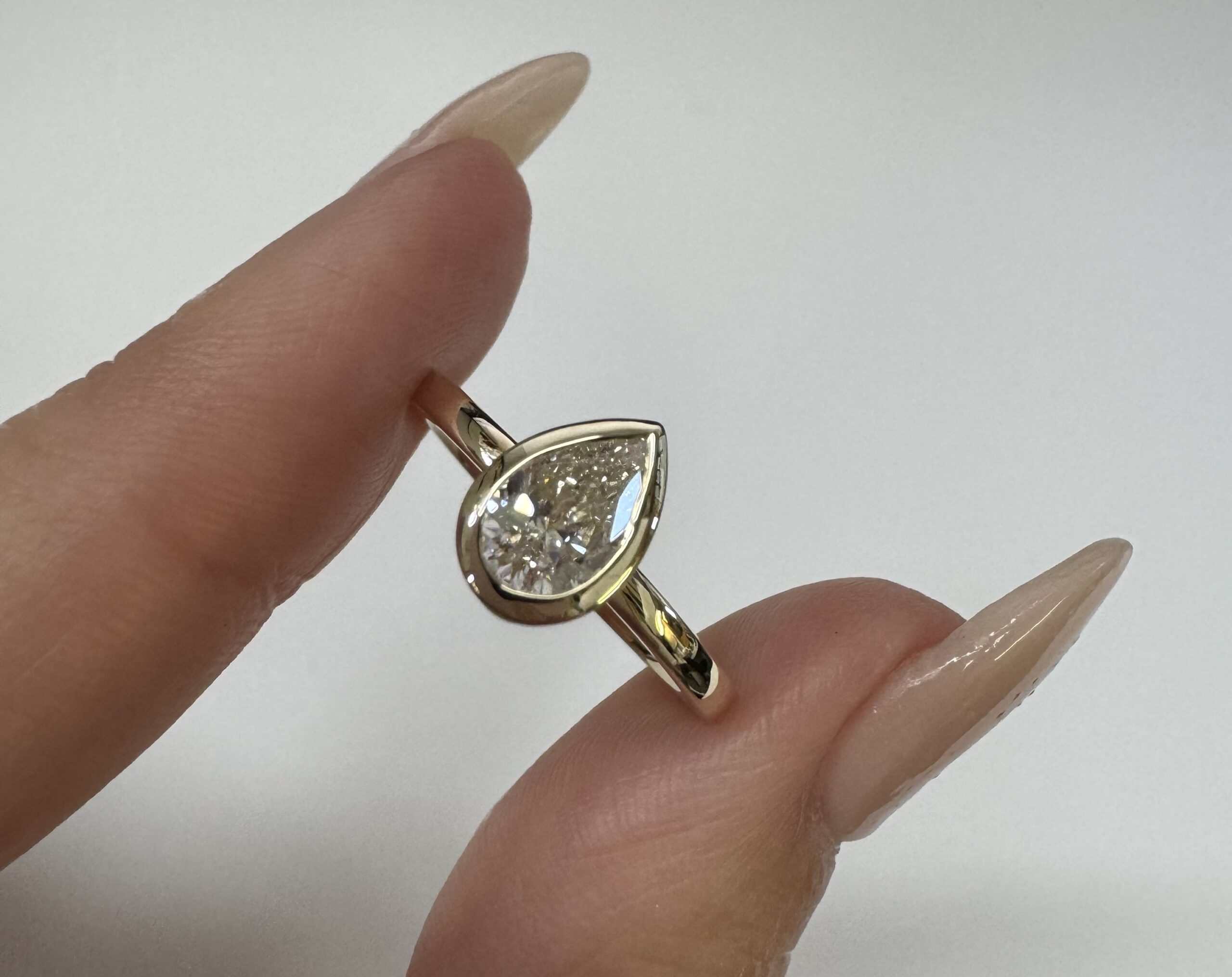 14k Yellow Gold Genuine Lab Grown .73 Cttw Pear Shaped Diamond Bezel Ring