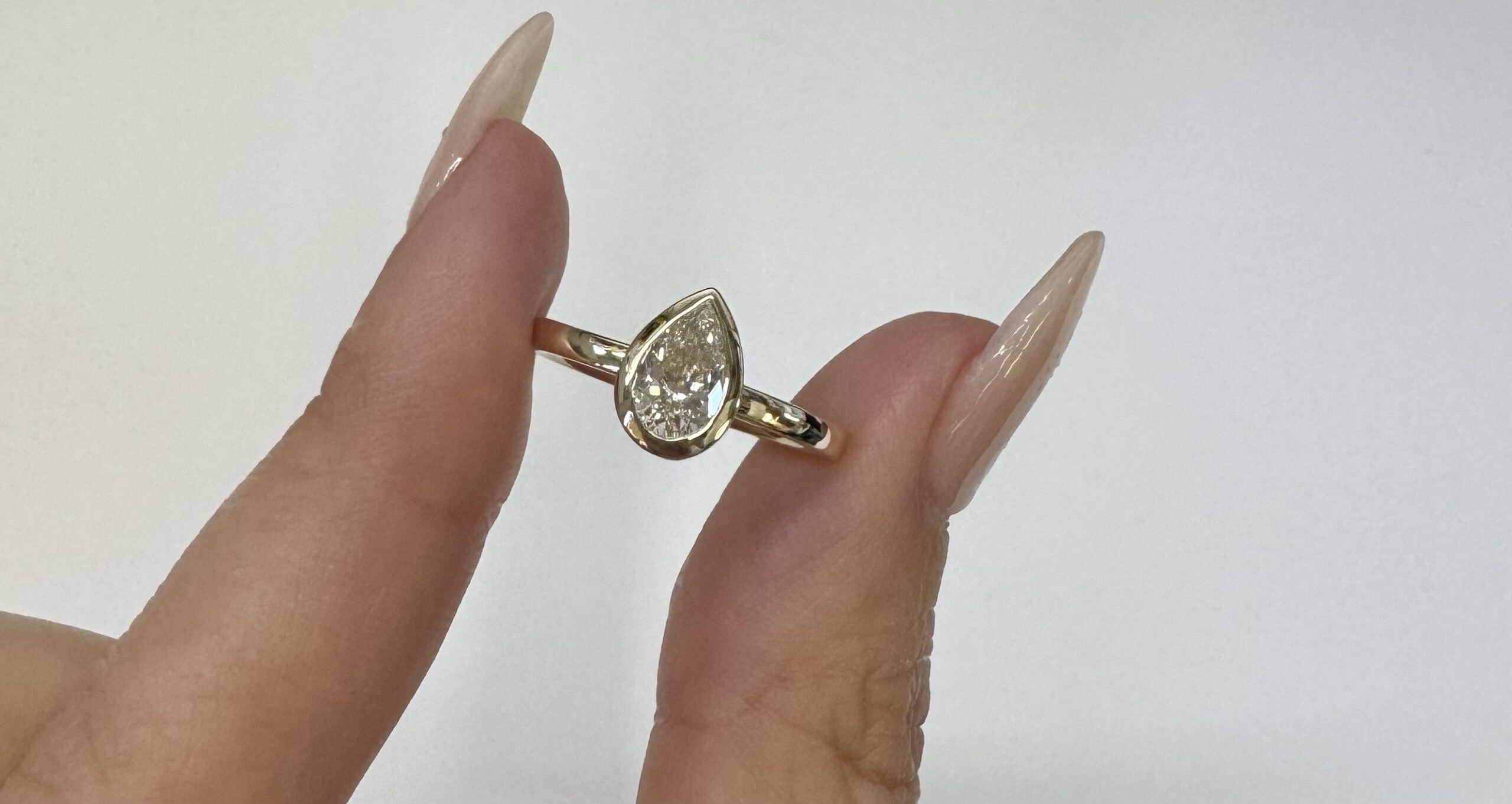 14k Yellow Gold Genuine Lab Grown .73 Cttw Pear Shaped Diamond Bezel Ring - Image 2