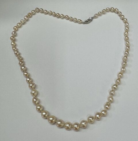 An 18" Strand Of Baroque Freshwater Pearls