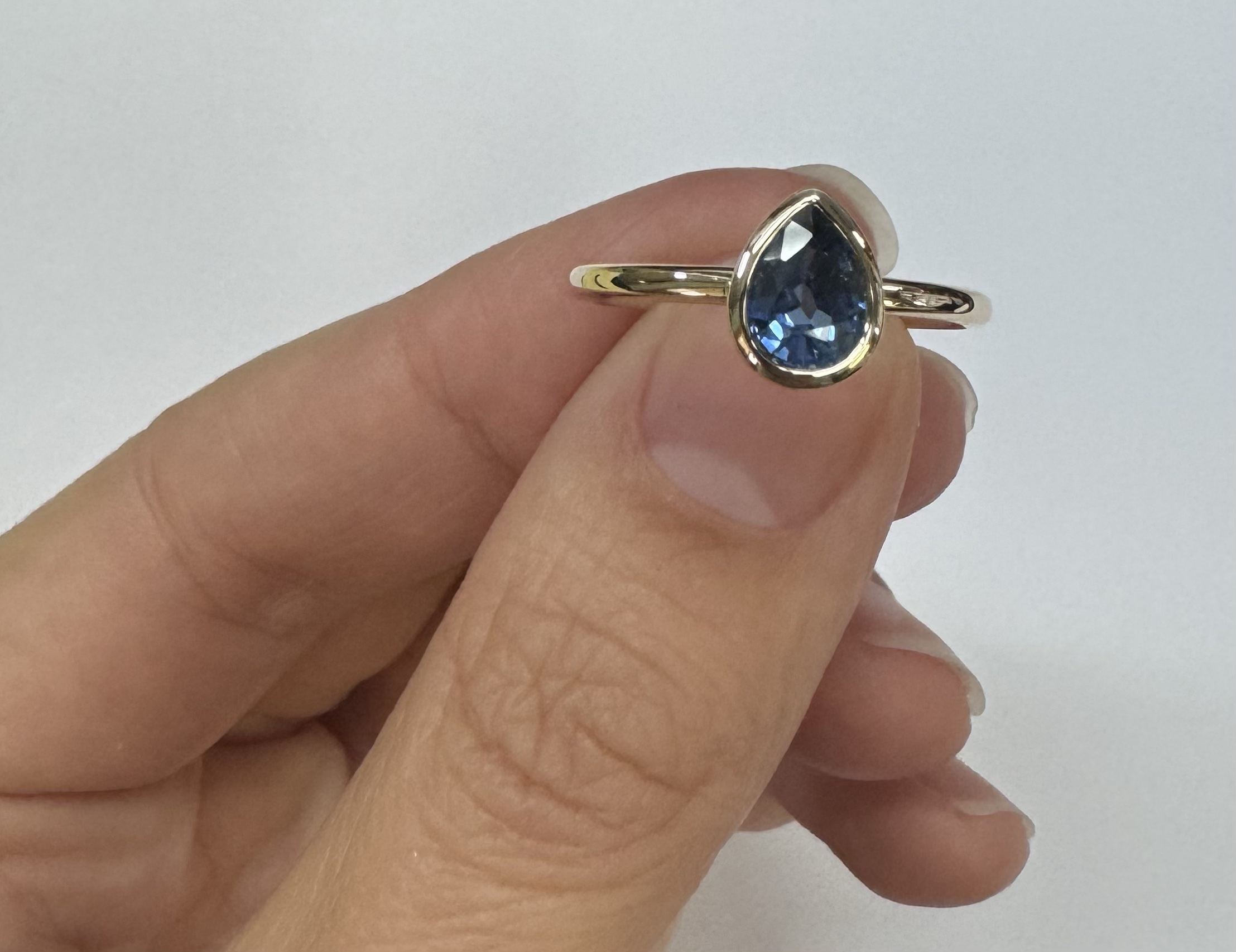 14k Yellow Gold .73 Cttw Pear Shaped Ceylon Sapphire Bezel Set Ring - Image 2