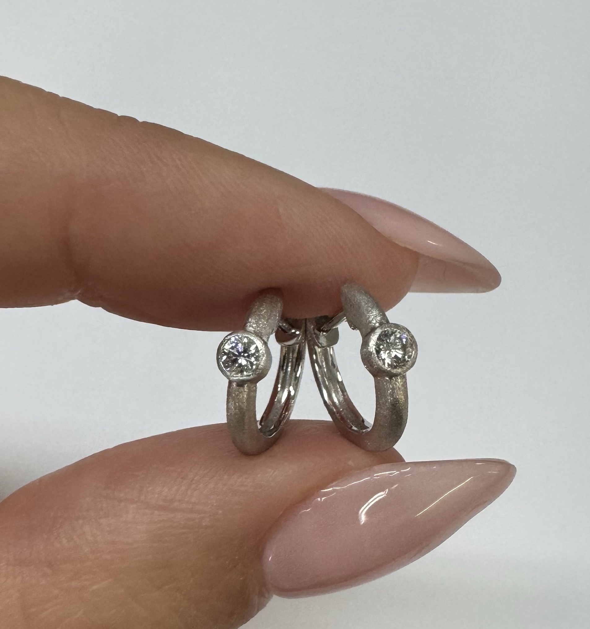 14k White Gold Genuine .15 Cttw Round Brilliant Cut Diamond Bezel Set Hoop Earrings - Image 7