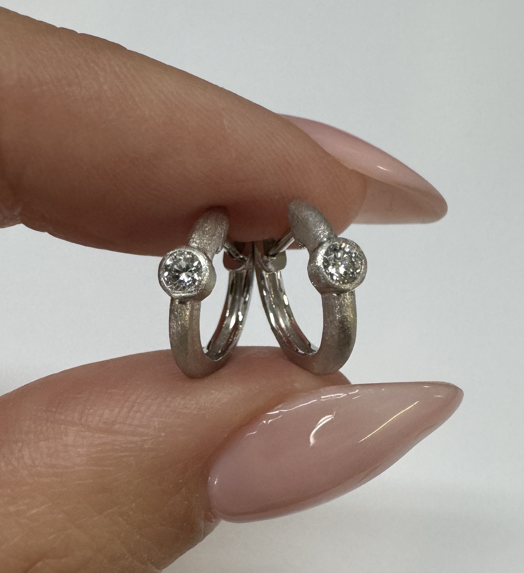 14k White Gold Genuine .15 Cttw Round Brilliant Cut Diamond Bezel Set Hoop Earrings - Image 6