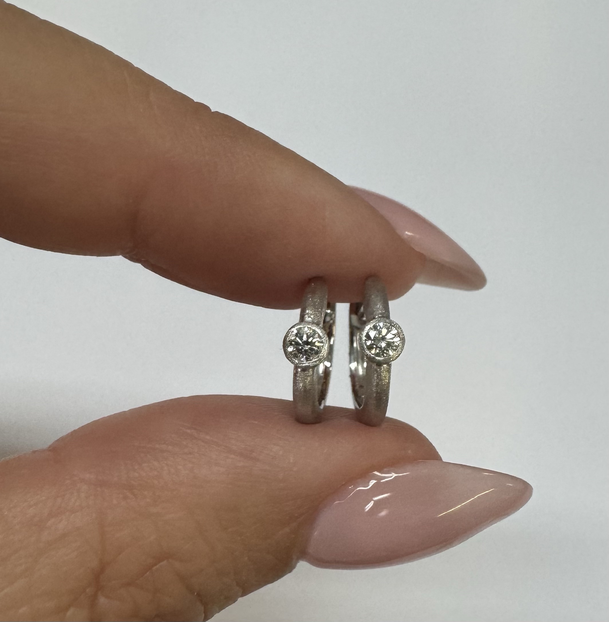 14k White Gold Genuine .15 Cttw Round Brilliant Cut Diamond Bezel Set Hoop Earrings - Image 3