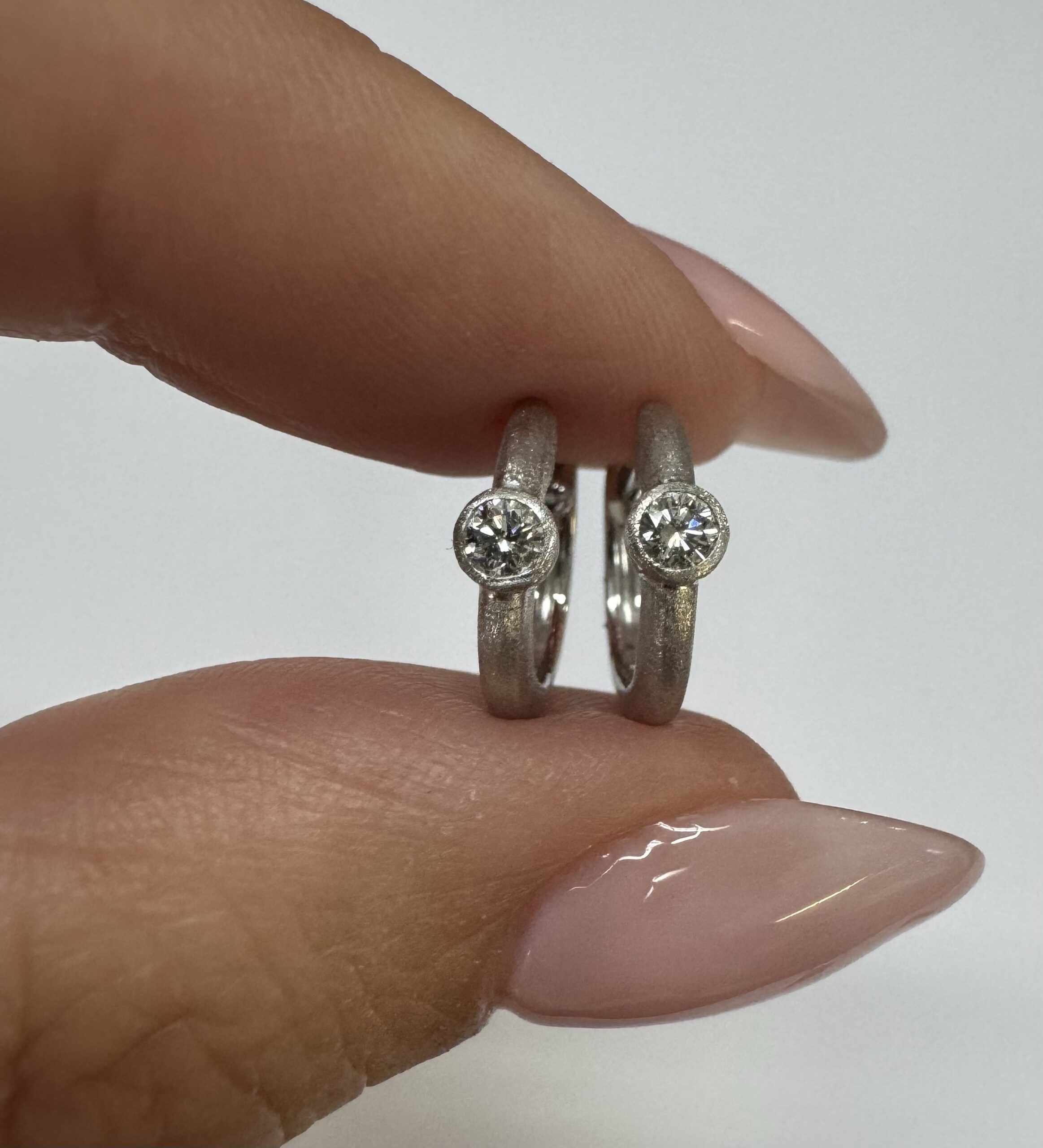 14k White Gold Genuine .15 Cttw Round Brilliant Cut Diamond Bezel Set Hoop Earrings