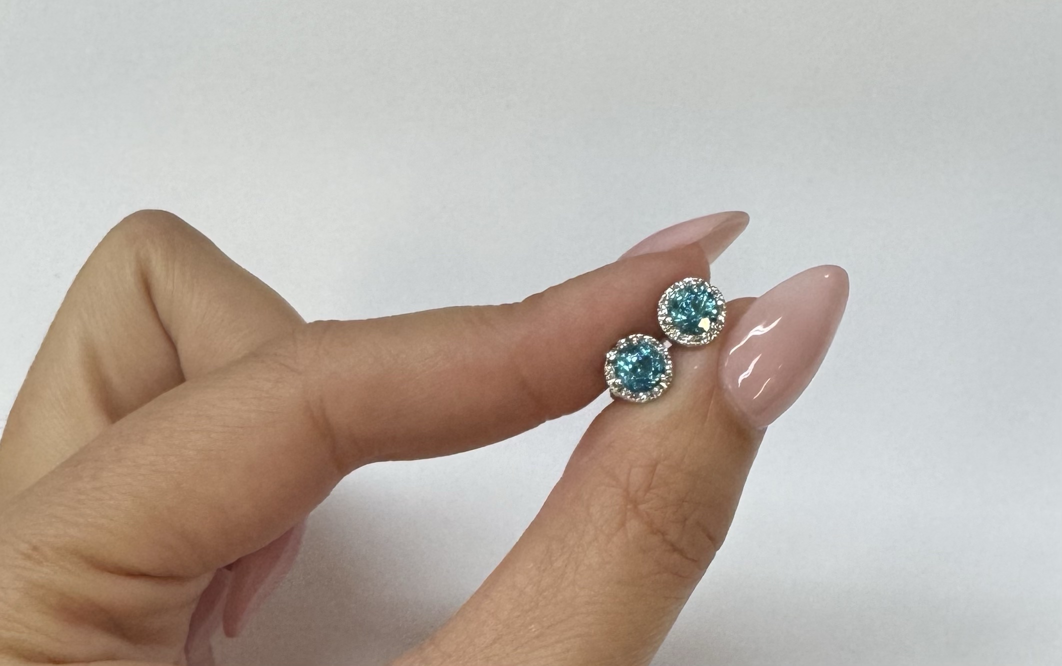 14k White Gold 2.54 Cttw Blue Zircon & .21 Cttw Diamond Halo Stud Earrings - Image 2