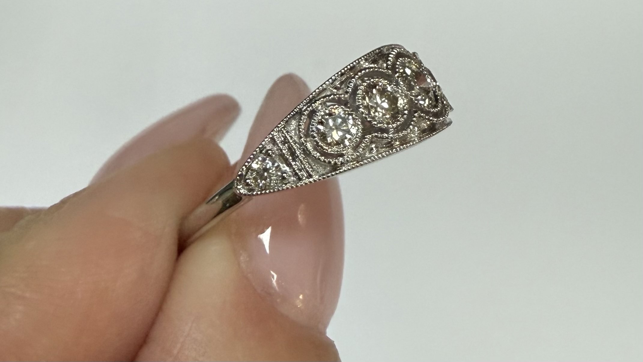 14k White Gold Vintage Inspired 7 Stone Bezel Graudated Round Brilliant Cut Diamond Band - Image 11