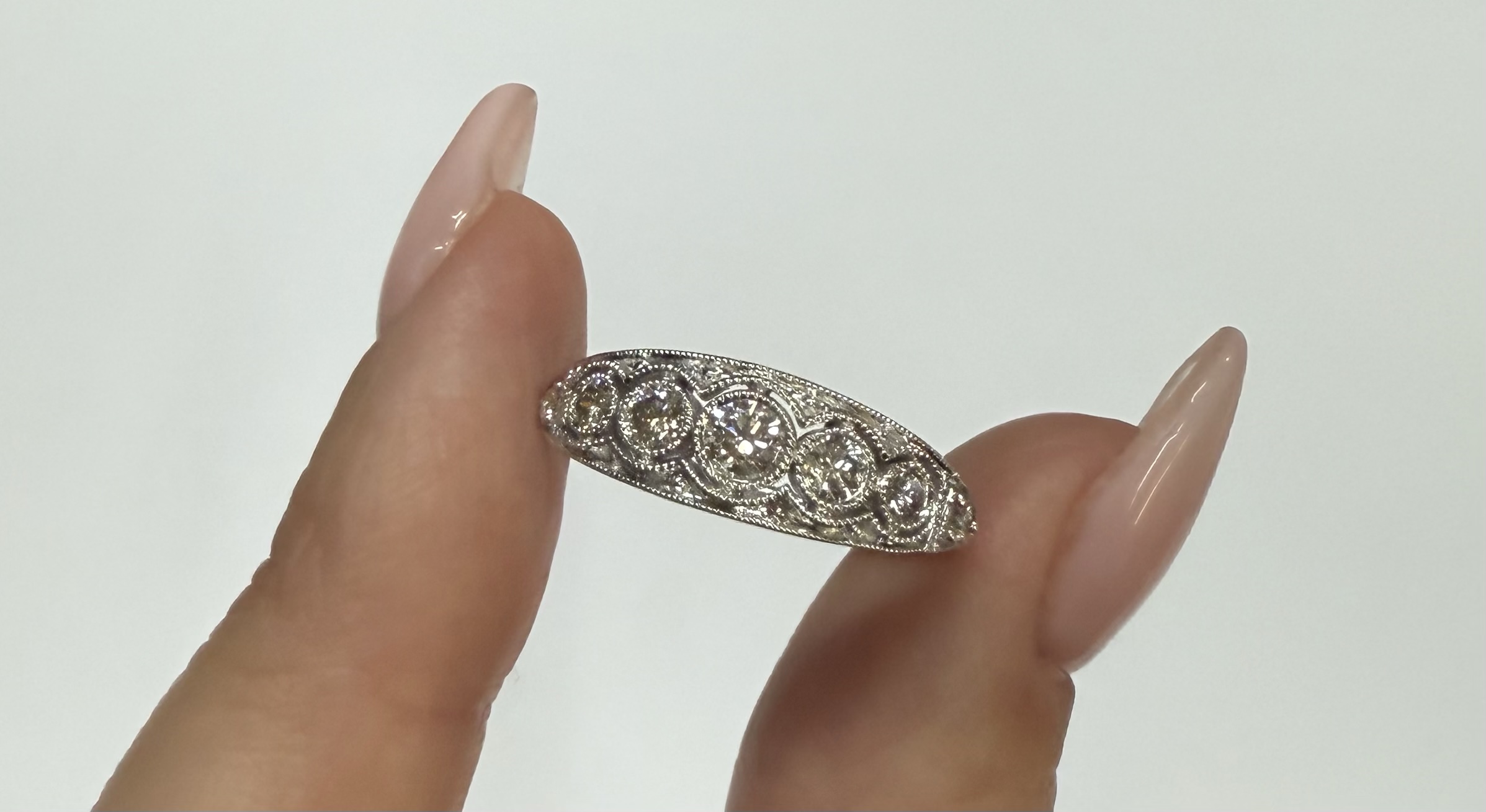 14k White Gold Vintage Inspired 7 Stone Bezel Graudated Round Brilliant Cut Diamond Band