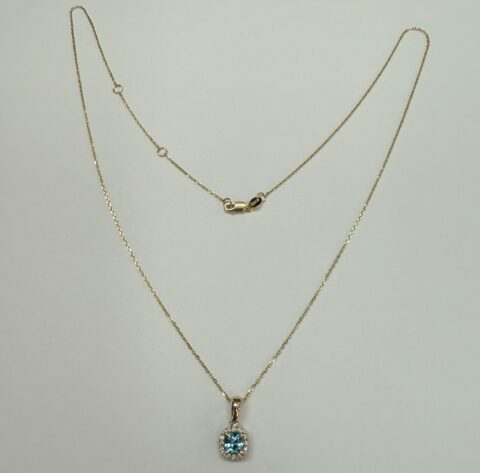 14k Yellow Gold Genuine .96 Cttw Blue Zircon & Genuine .07 Cttw Round Brilliant Cut Diamond Halo Pendant