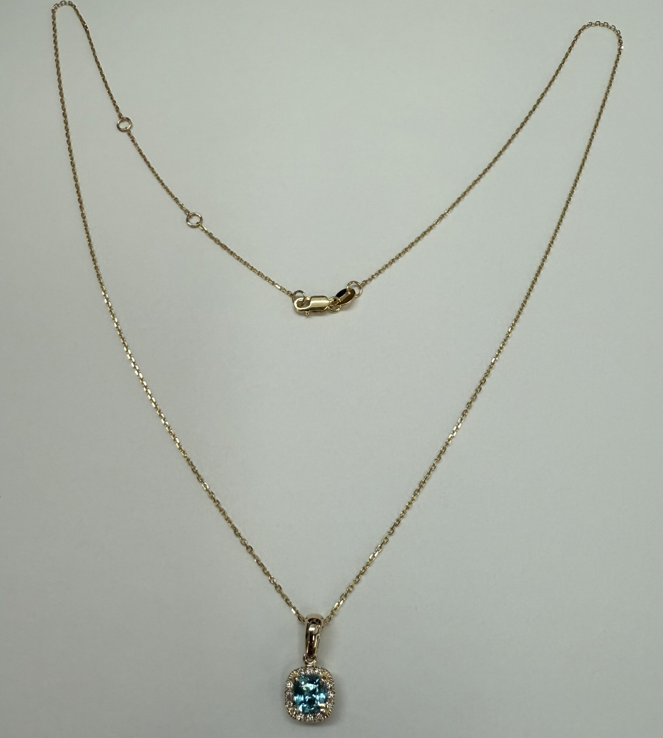 14k Yellow Gold Genuine .96 Cttw Blue Zircon & Genuine .07 Cttw Round Brilliant Cut Diamond Halo Pendant - Image 2