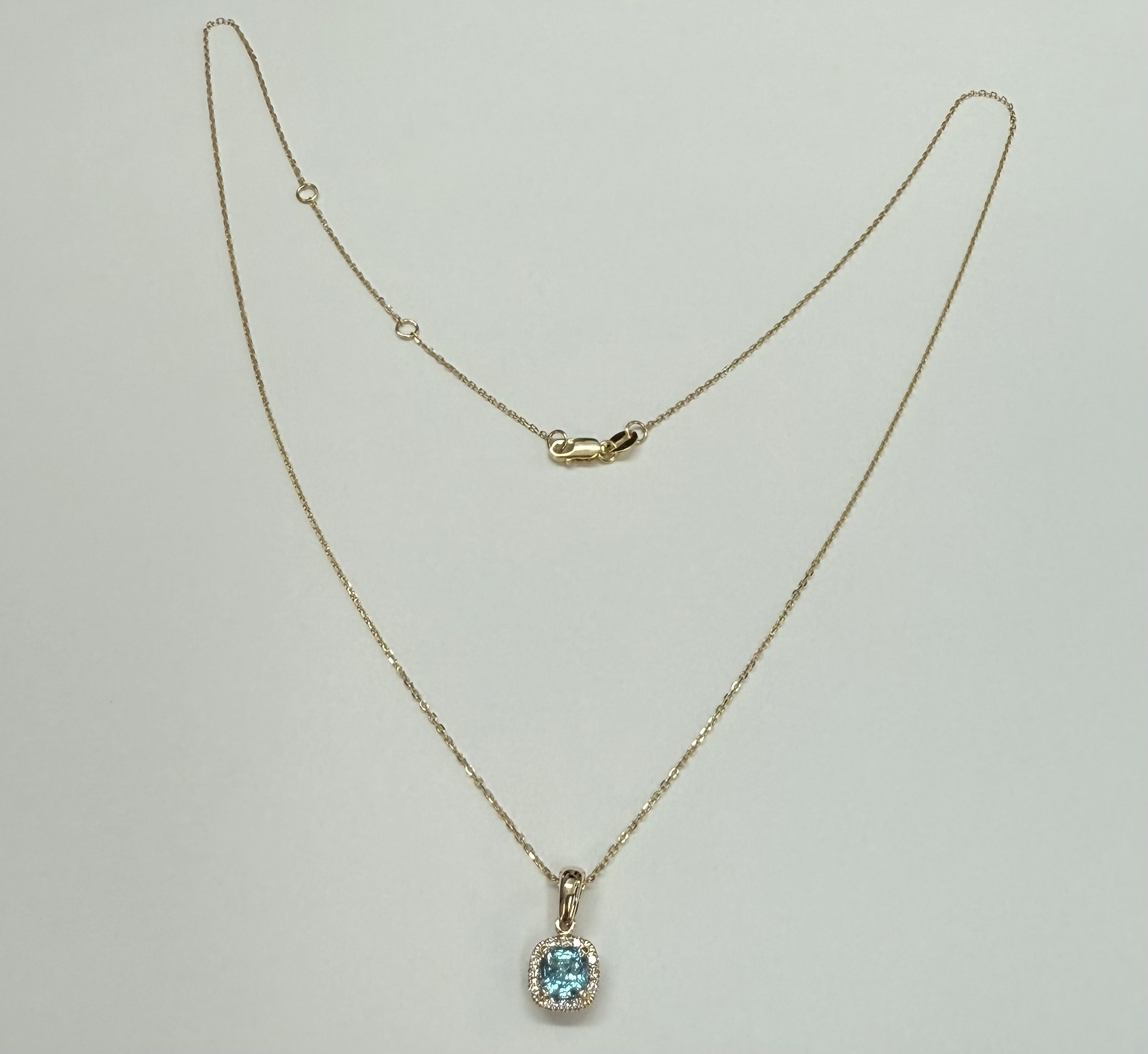 14k Yellow Gold Genuine .96 Cttw Blue Zircon & Genuine .07 Cttw Round Brilliant Cut Diamond Halo Pendant - Image 13