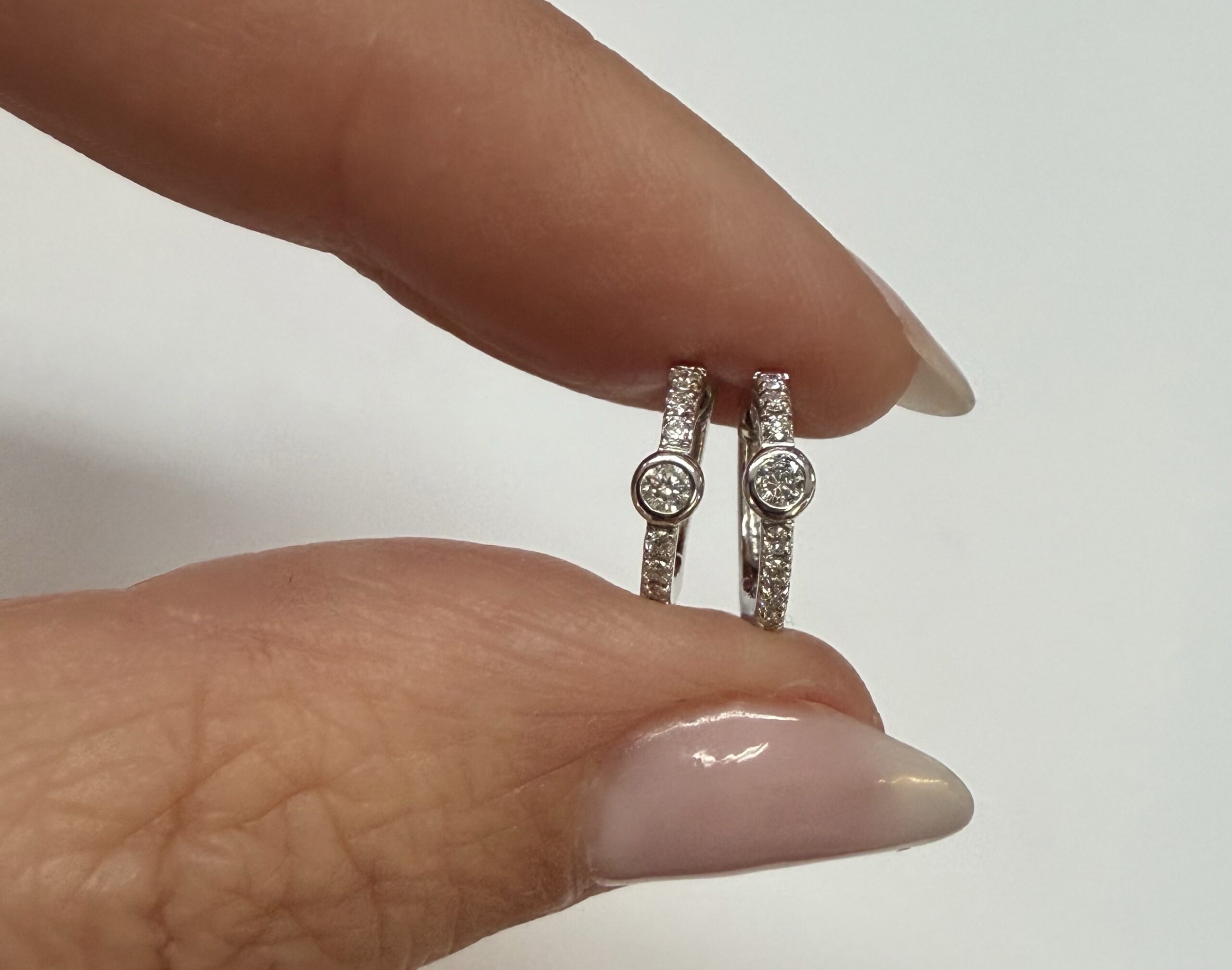 14k White Gold Bezel Set Genuine Diamond .12 Cttw Huggy Hoop Earrings - Image 7