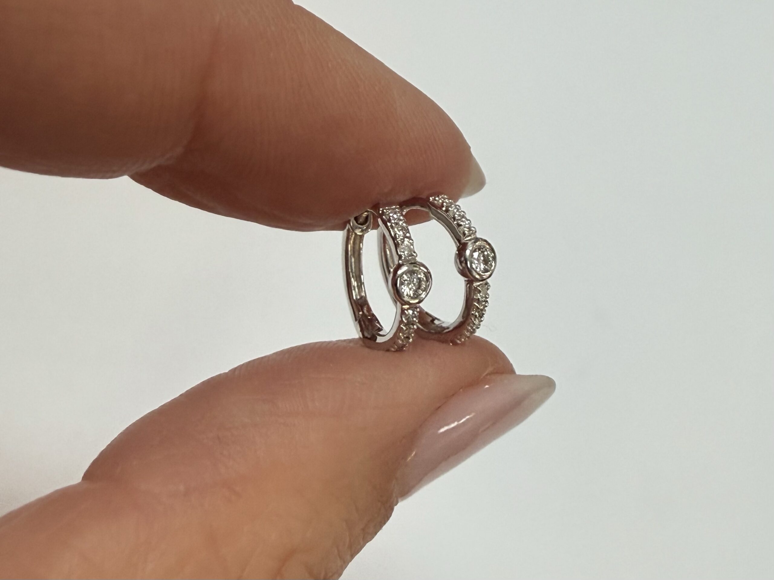 14k White Gold Bezel Set Genuine Diamond .12 Cttw Huggy Hoop Earrings - Image 10