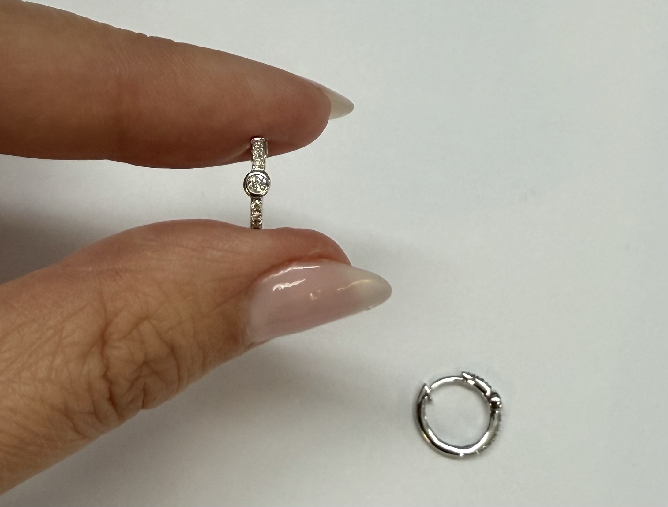 14k White Gold Bezel Set Genuine Diamond .12 Cttw Huggy Hoop Earrings - Image 17