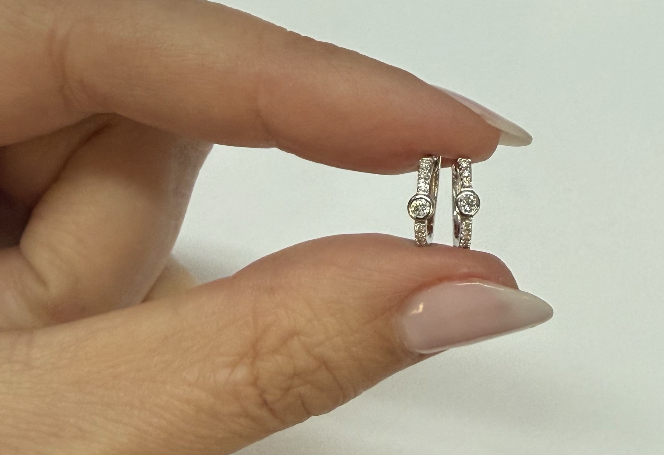 14k White Gold Bezel Set Genuine Diamond .12 Cttw Huggy Hoop Earrings - Image 11