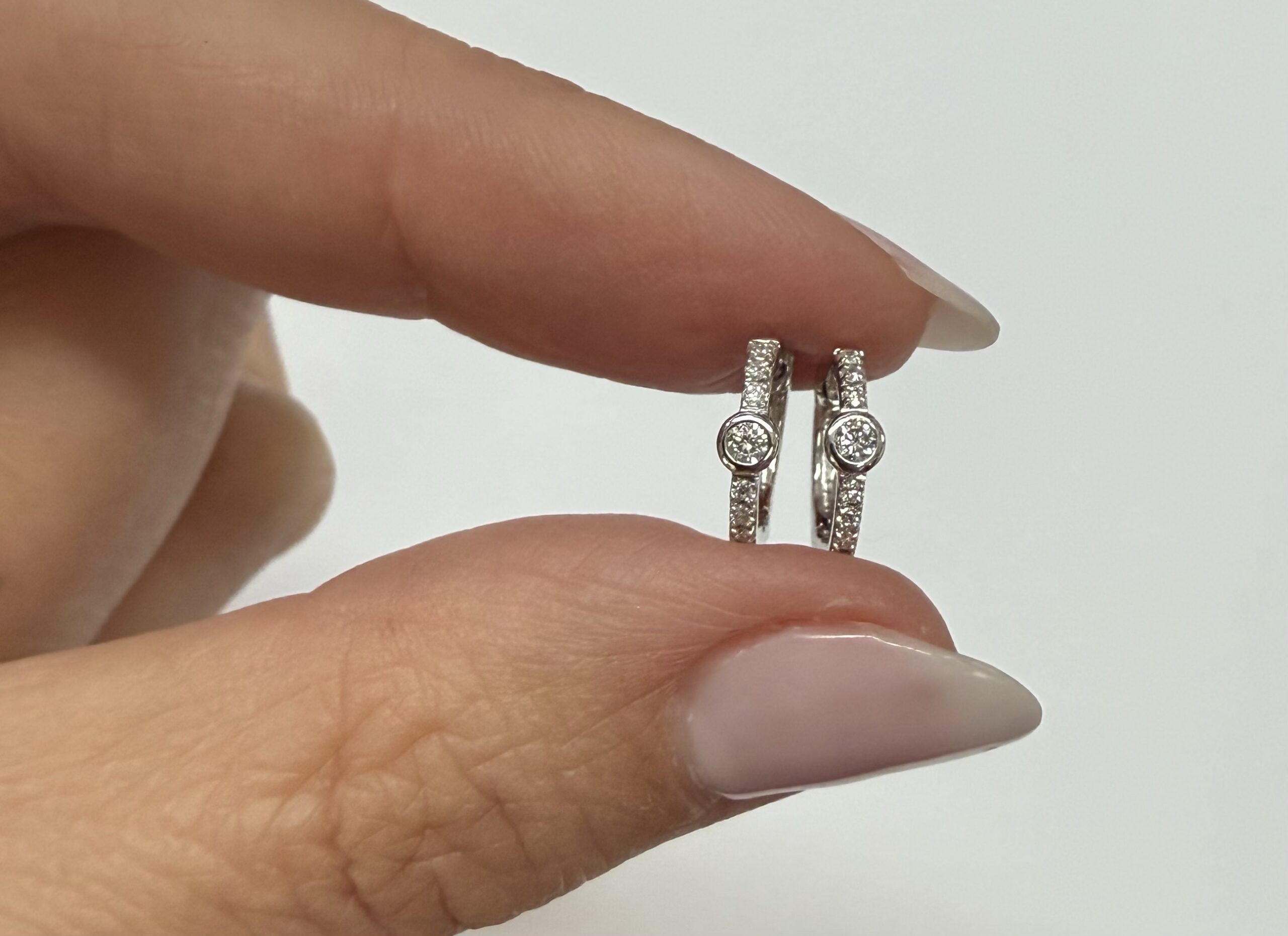 14k White Gold Bezel Set Genuine Diamond .12 Cttw Huggy Hoop Earrings - Image 13