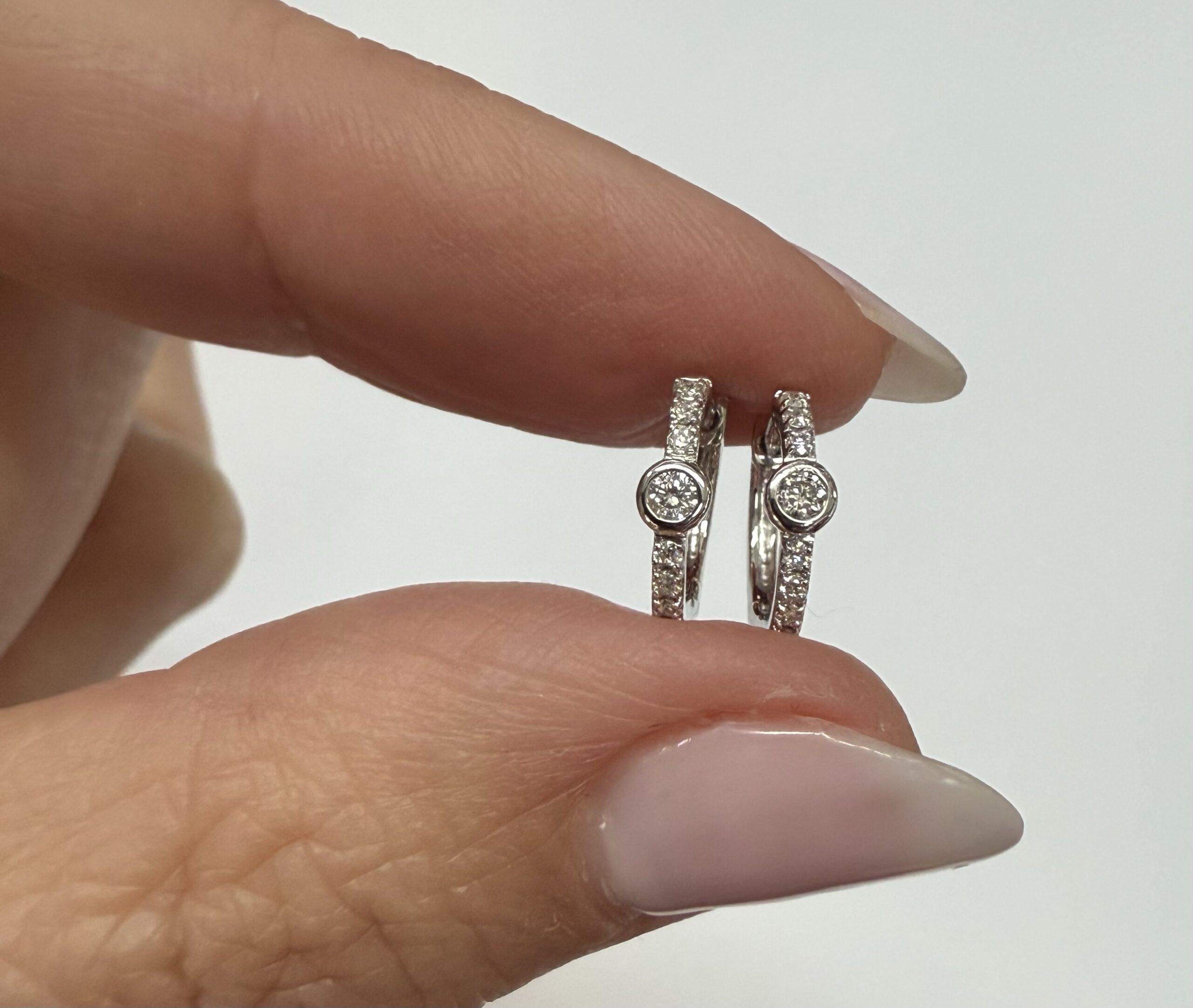 14k White Gold Bezel Set Genuine Diamond .12 Cttw Huggy Hoop Earrings - Image 14