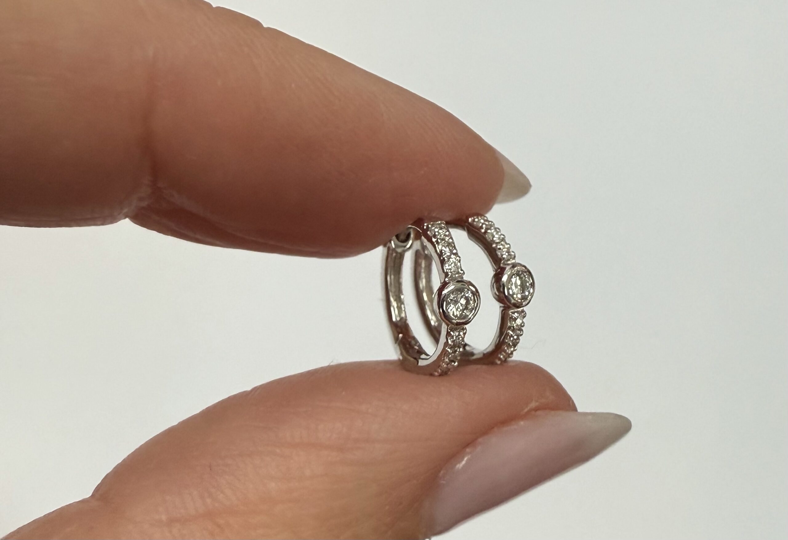 14k White Gold Bezel Set Genuine Diamond .12 Cttw Huggy Hoop Earrings - Image 16