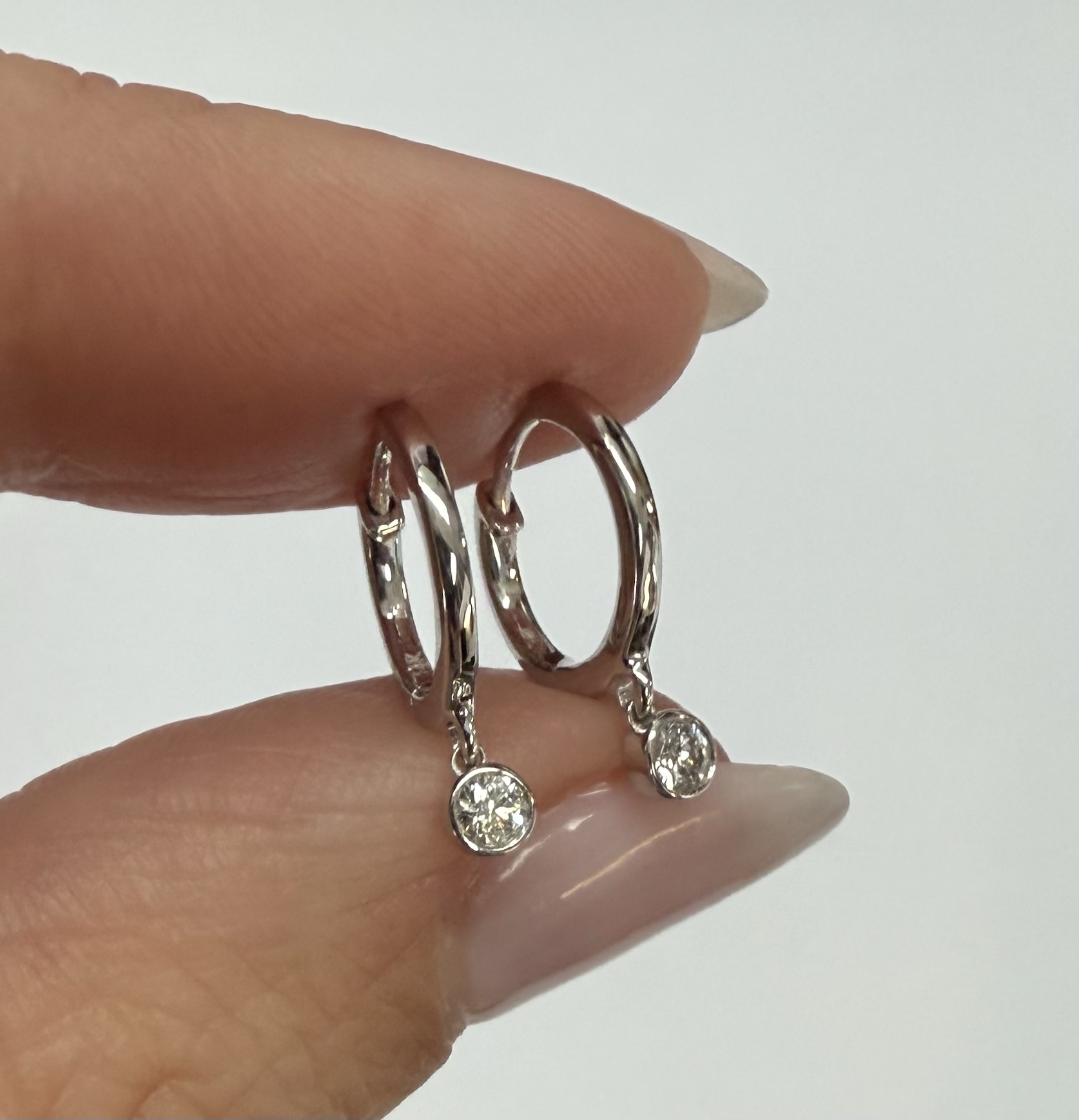 14k White Gold Genuine .08 Cttw Diamond Bezel Dangle Huggy Hoop Earrings - Image 11