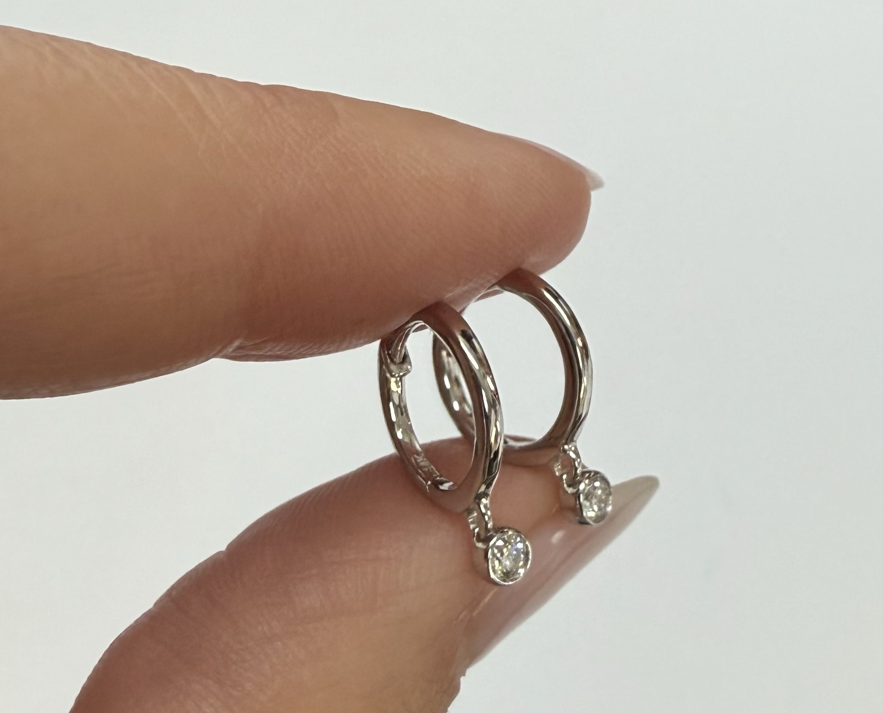 14k White Gold Genuine .08 Cttw Diamond Bezel Dangle Huggy Hoop Earrings - Image 16