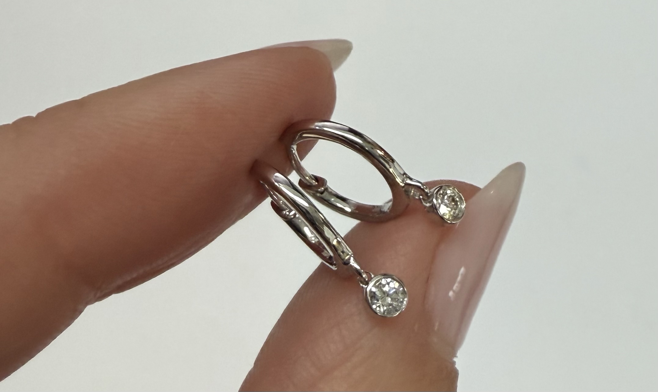 14k White Gold Genuine .08 Cttw Diamond Bezel Dangle Huggy Hoop Earrings - Image 7