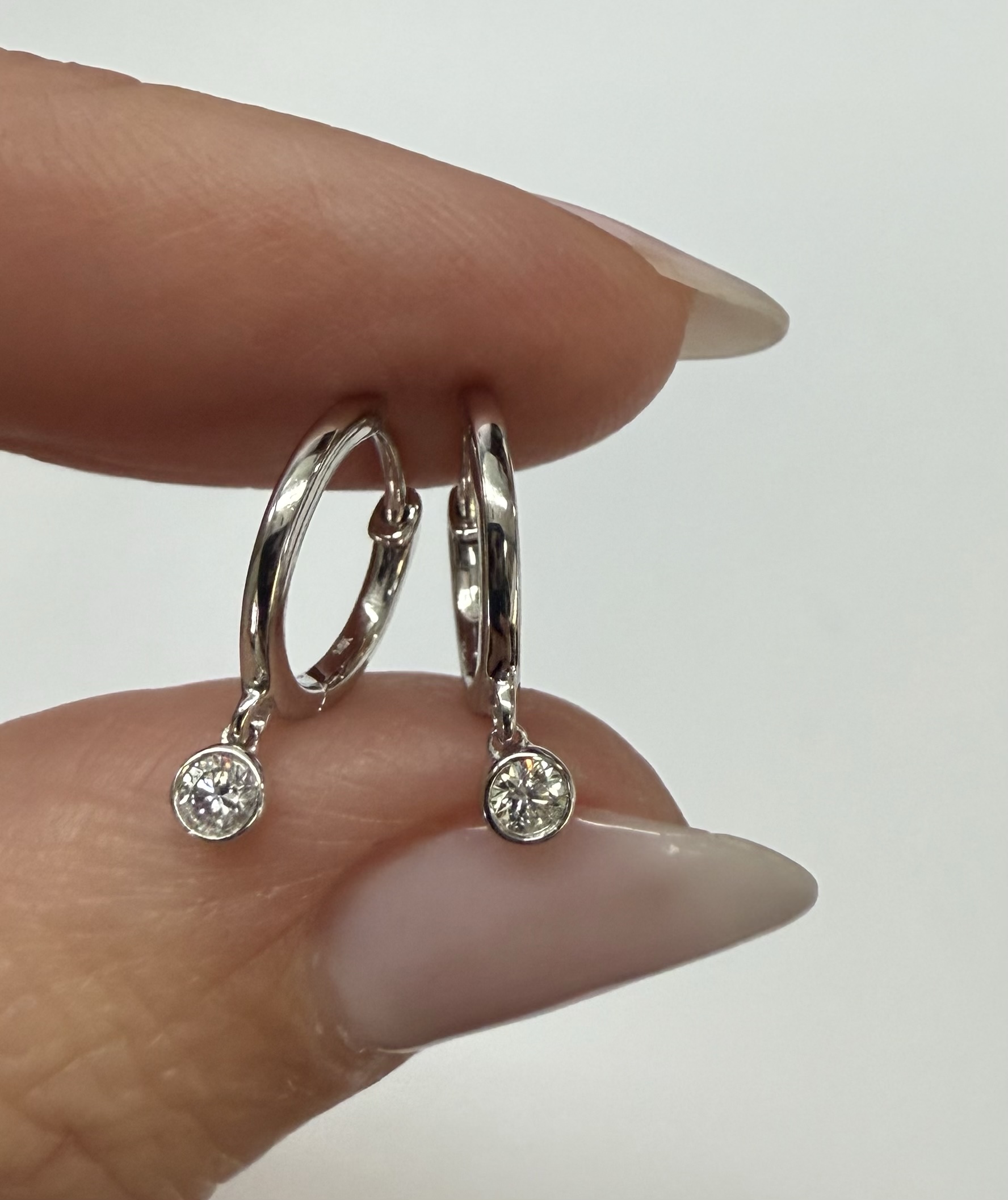 14k White Gold Genuine .08 Cttw Diamond Bezel Dangle Huggy Hoop Earrings - Image 10
