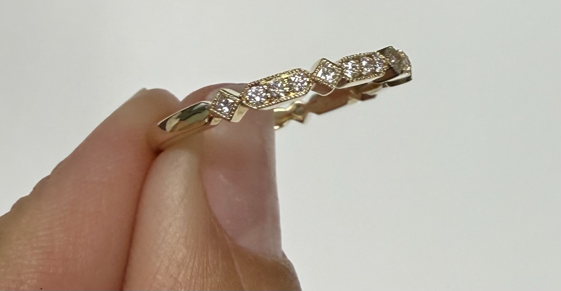 14k Yellow Gold 21 Stone Genuine .20 Cttw Round Brilliant Cut Diamond Band With Mill Grain Details - Image 3