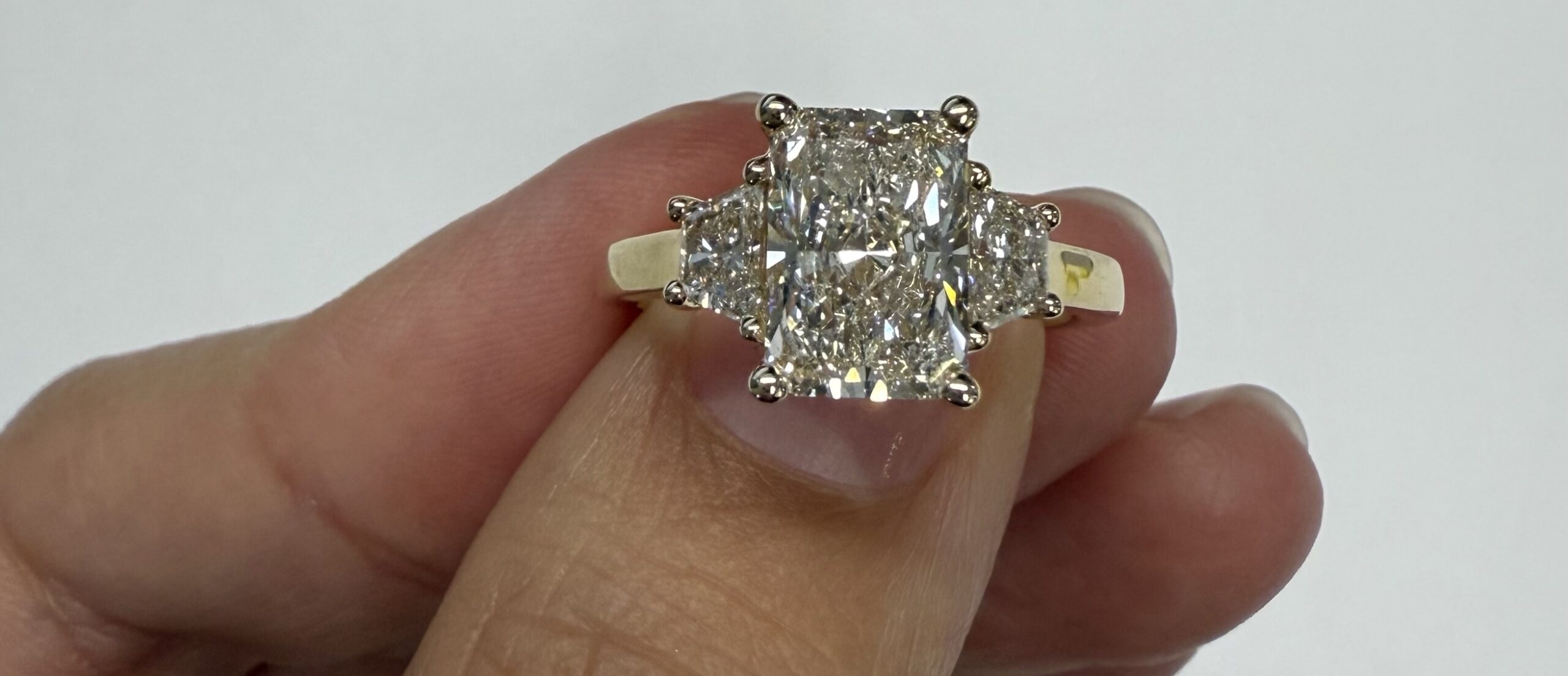 14k Yellow Gold IGI Certified Laboratory Grown 2.08 Carat Radiant Cut Diamond & .47 Cttw Trapezoid Diamond Ring