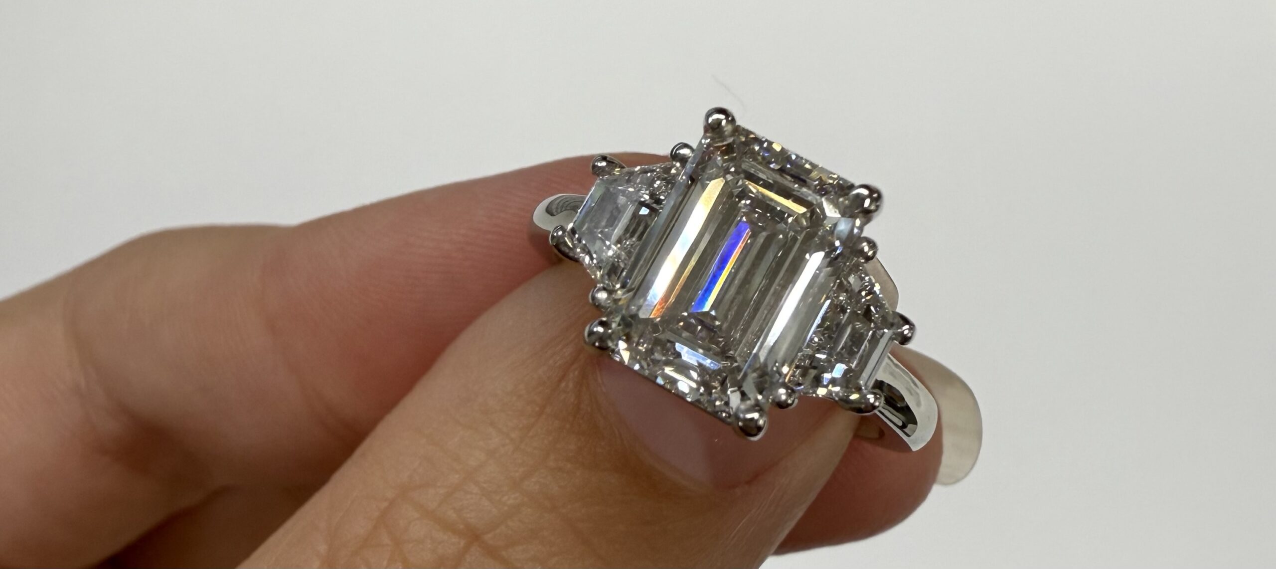 Custom Made Platinum IGI Certified Genuine 3.07 Carat Laboratory Grown Emerald Cut Diamond & Trapezoid Ring